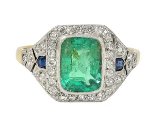 French Art Deco 1920 2.61 CTW Emerald Diamond Sapphire Platinum 18 Karat Gold Antique Halo Ring