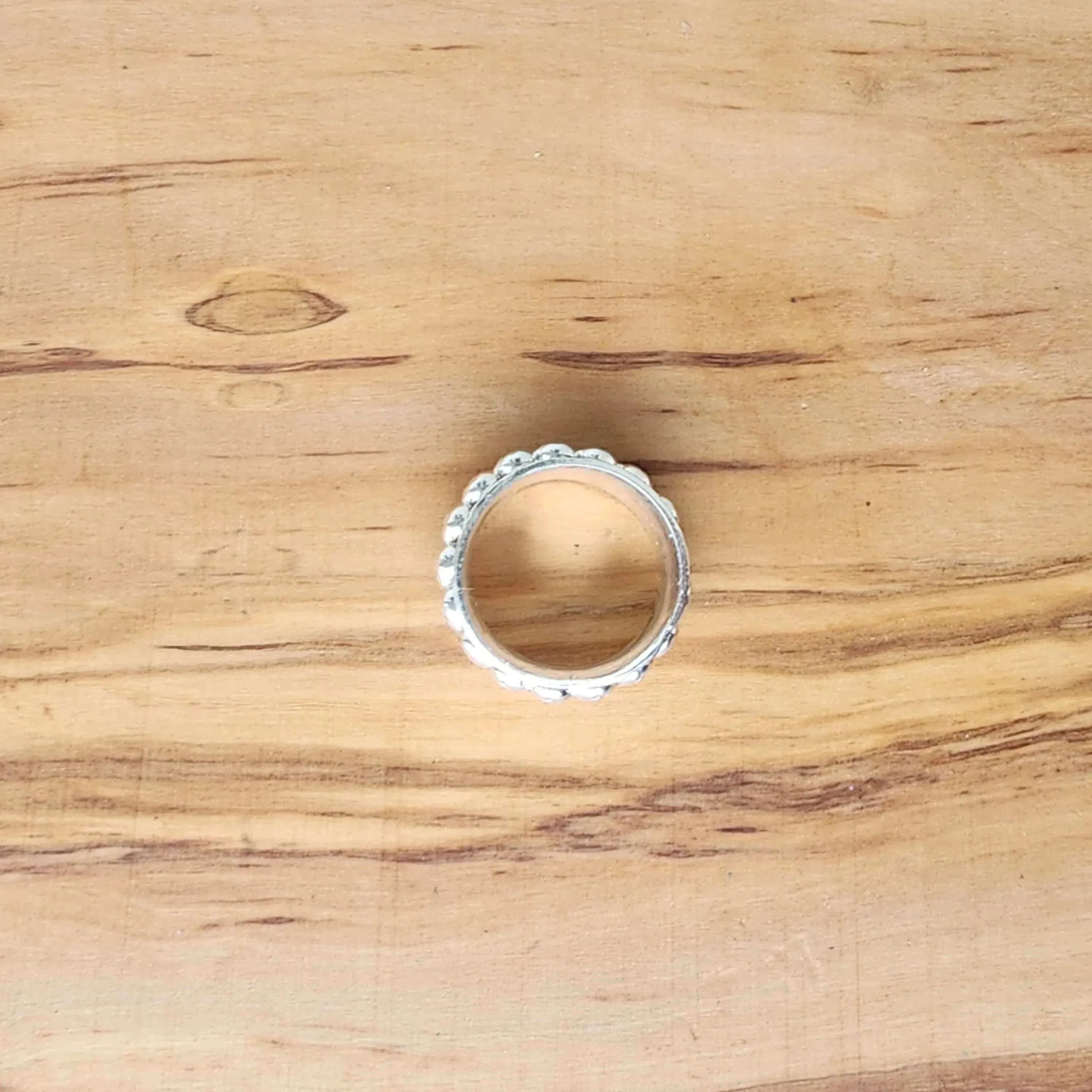 Handmade Boho .925 Sterling Silver Ring with Daisy Spinner | Bold Hammered Texture Jewelry