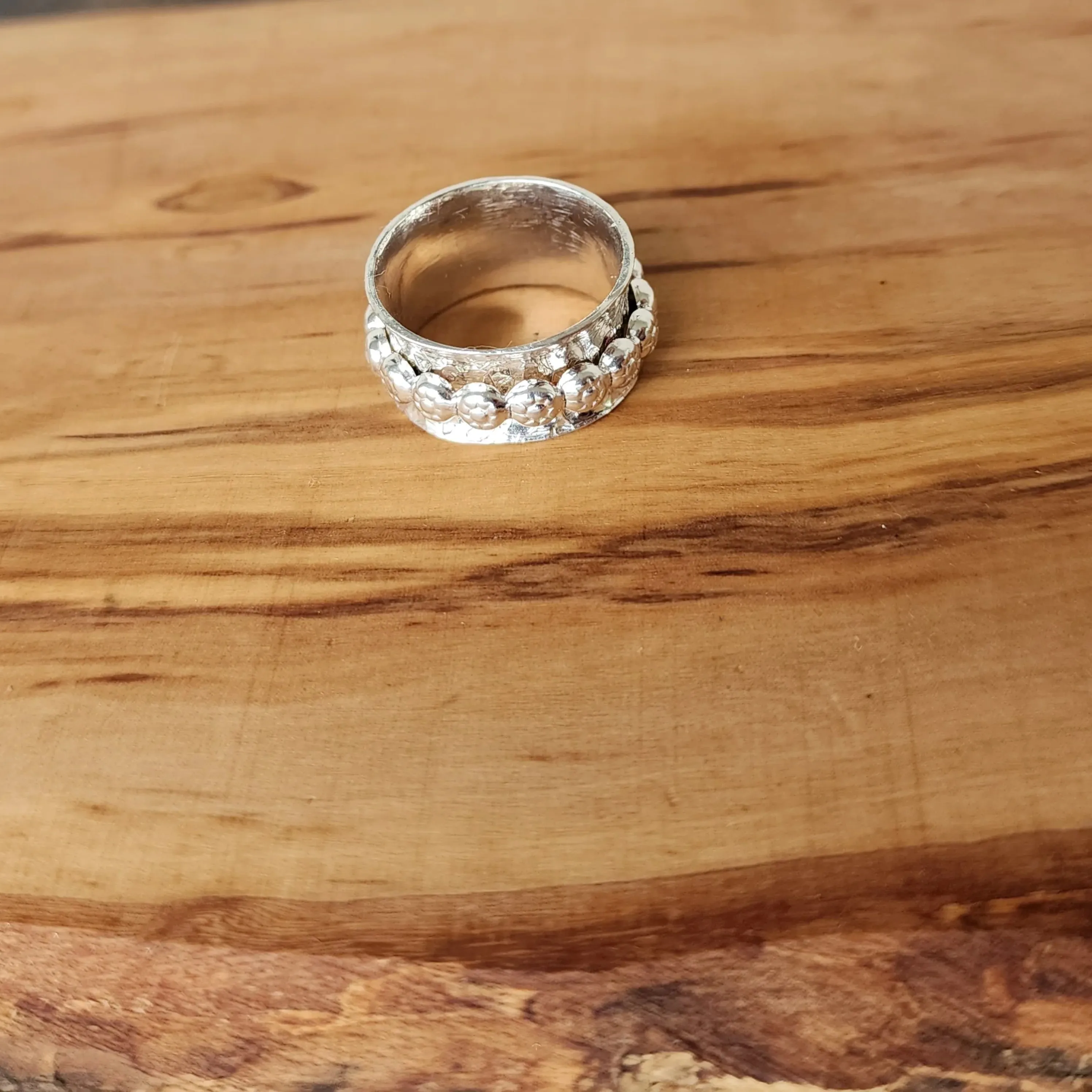 Handmade Boho .925 Sterling Silver Ring with Daisy Spinner | Bold Hammered Texture Jewelry