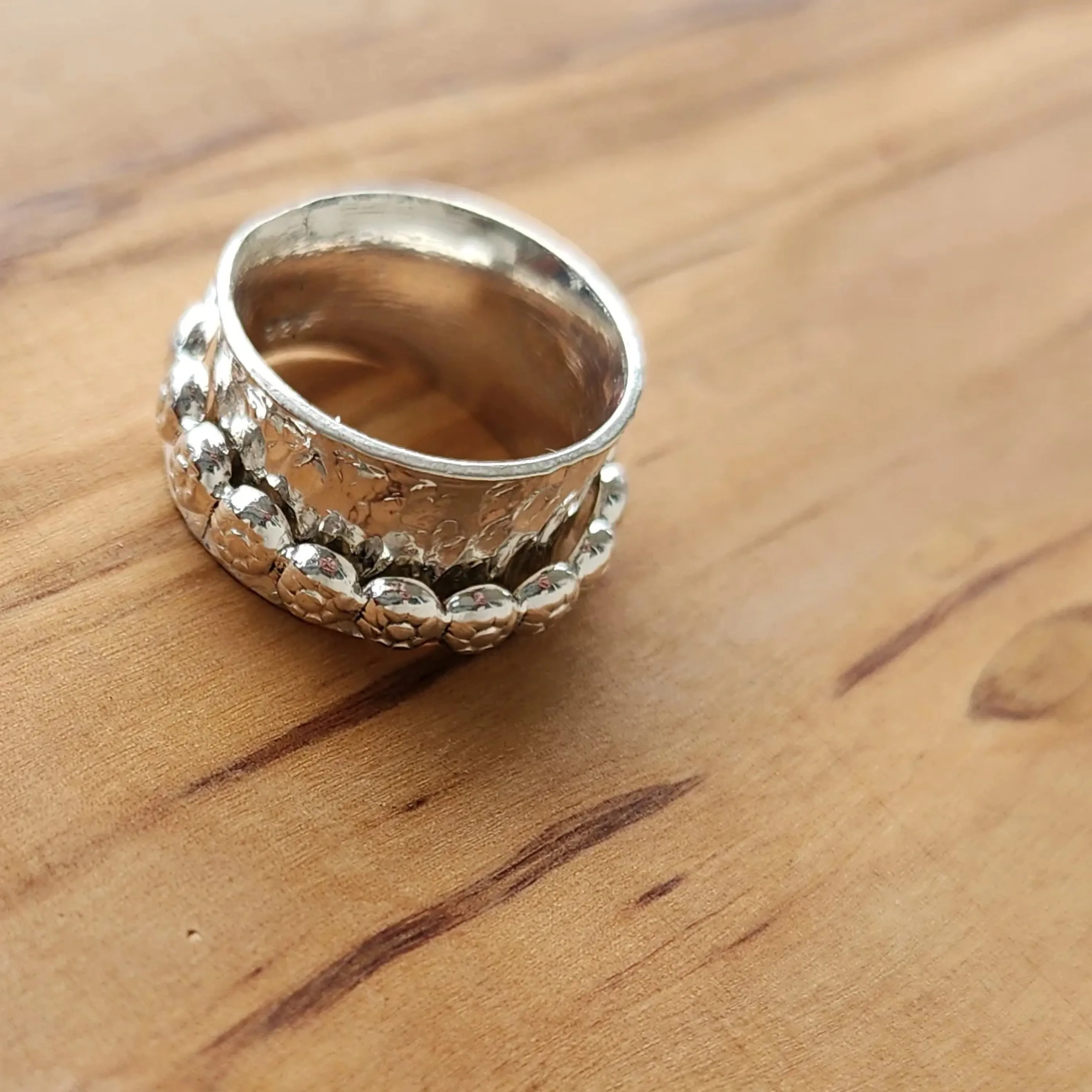 Handmade Boho .925 Sterling Silver Ring with Daisy Spinner | Bold Hammered Texture Jewelry
