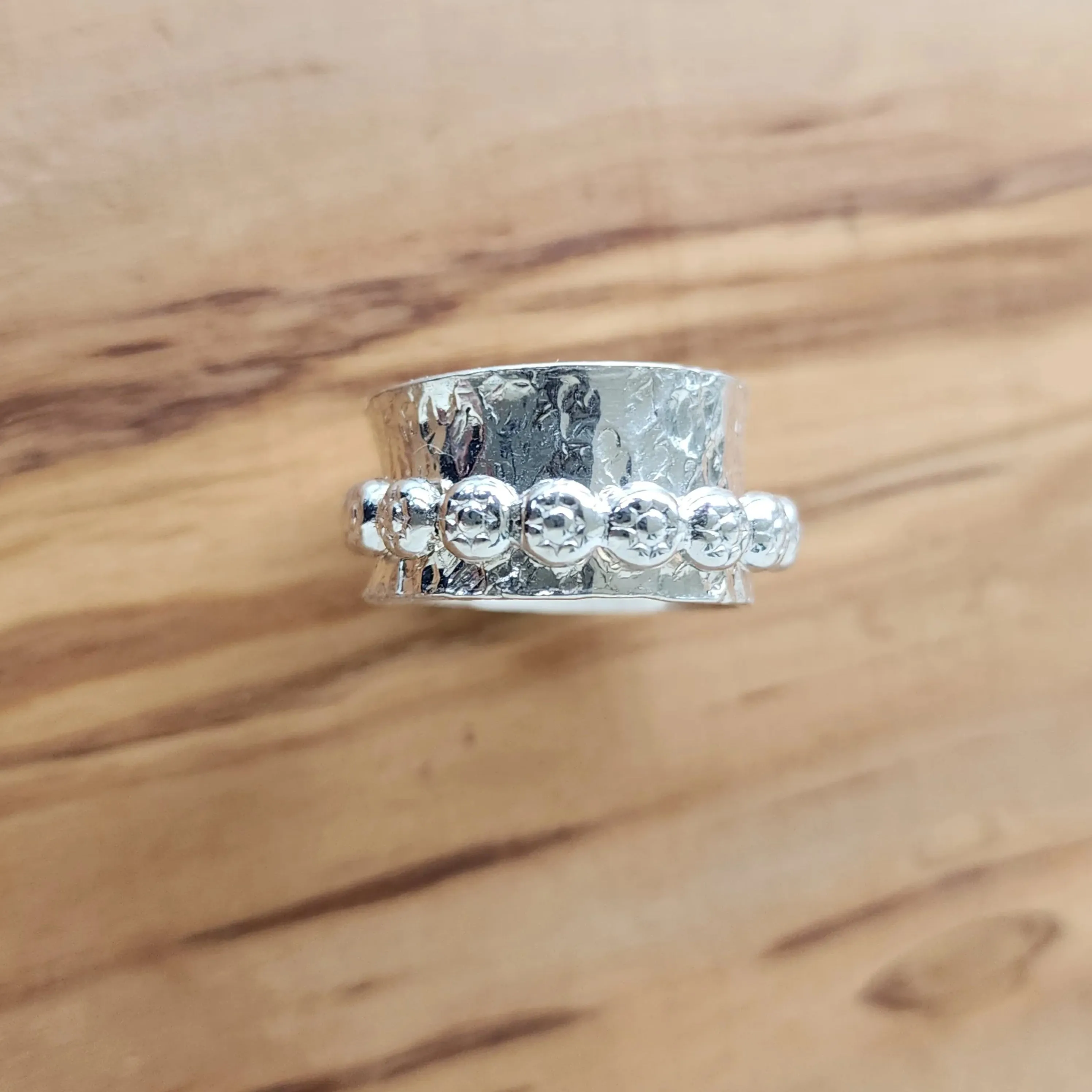 Handmade Boho .925 Sterling Silver Ring with Daisy Spinner | Bold Hammered Texture Jewelry
