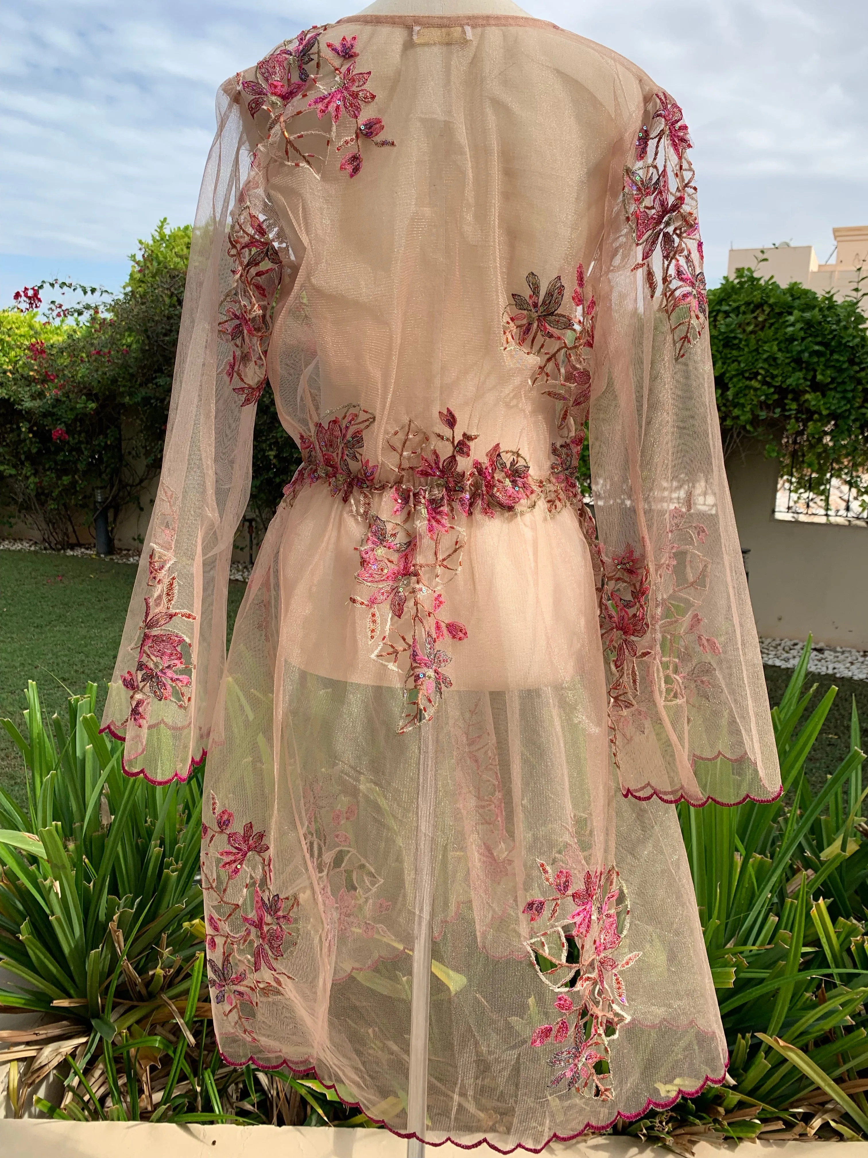 Luxurious laser cut, embroidered dress