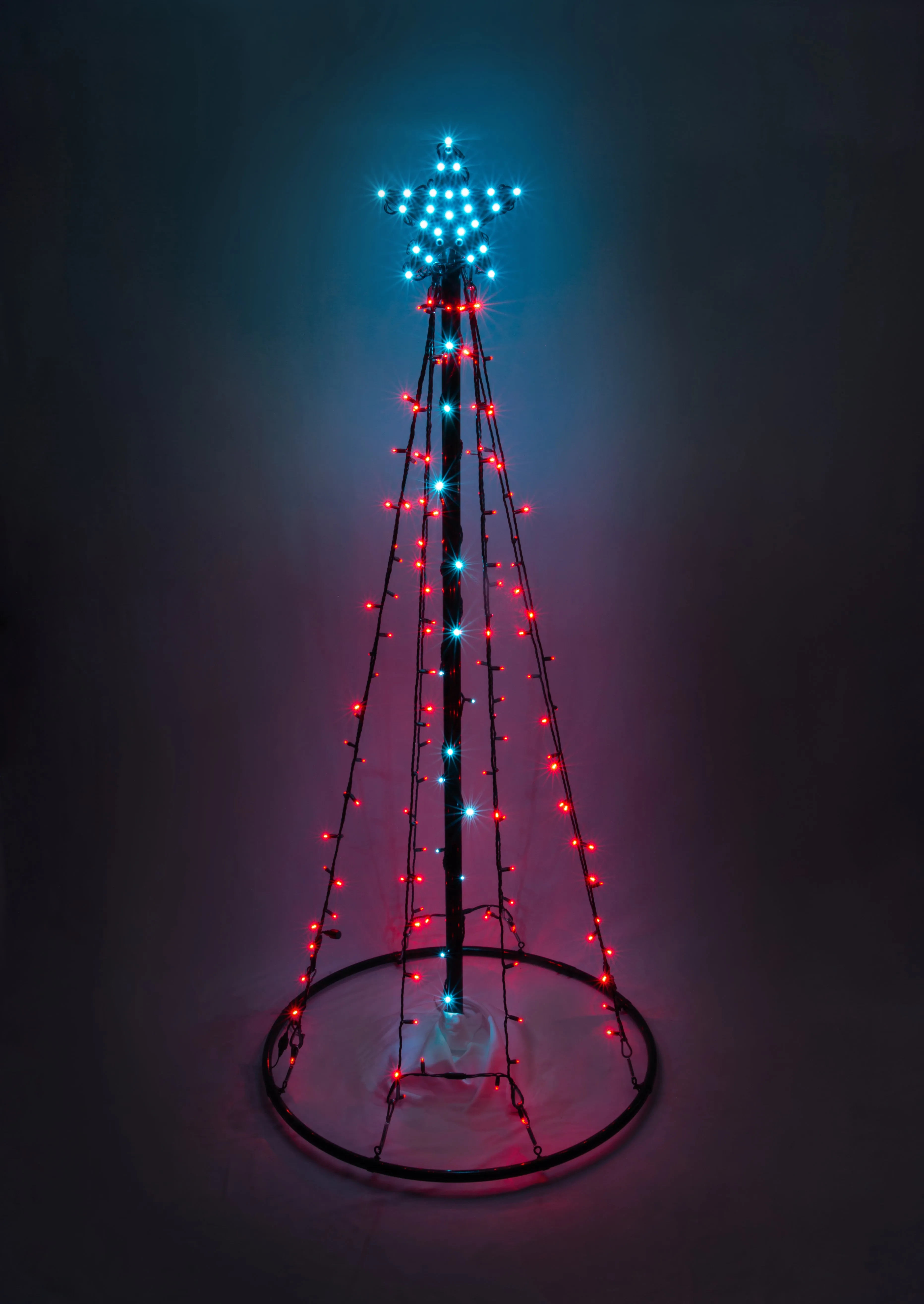 Outdoor LED Lighted Christmas Tree with Green Base and Orange and Purple Tree Lights