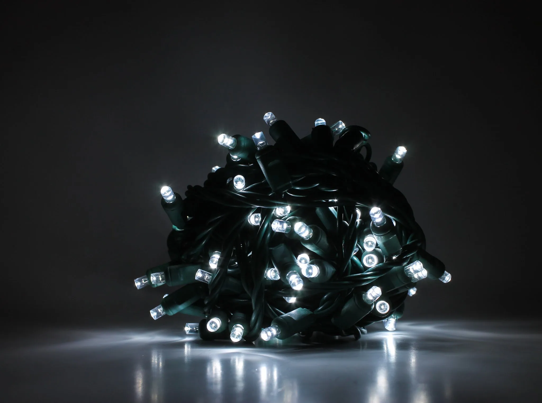 Outdoor LED Lighted Christmas Tree with Green Base and Orange and Purple Tree Lights